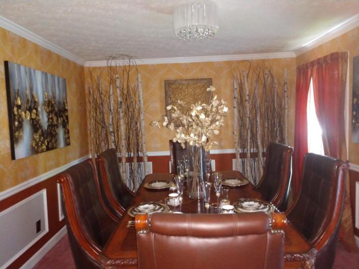 Installed wallpaper, painted walls, trim and installed light.